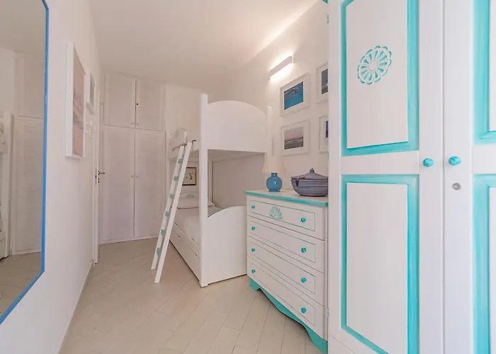 Апартаменты Laureliving Holiday Home Cala Maiore 01 *